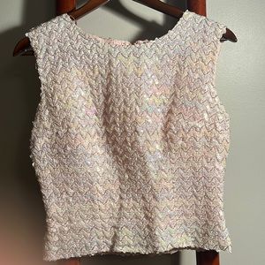 Razzle n dazzle in this light colored sparkly vintage top.